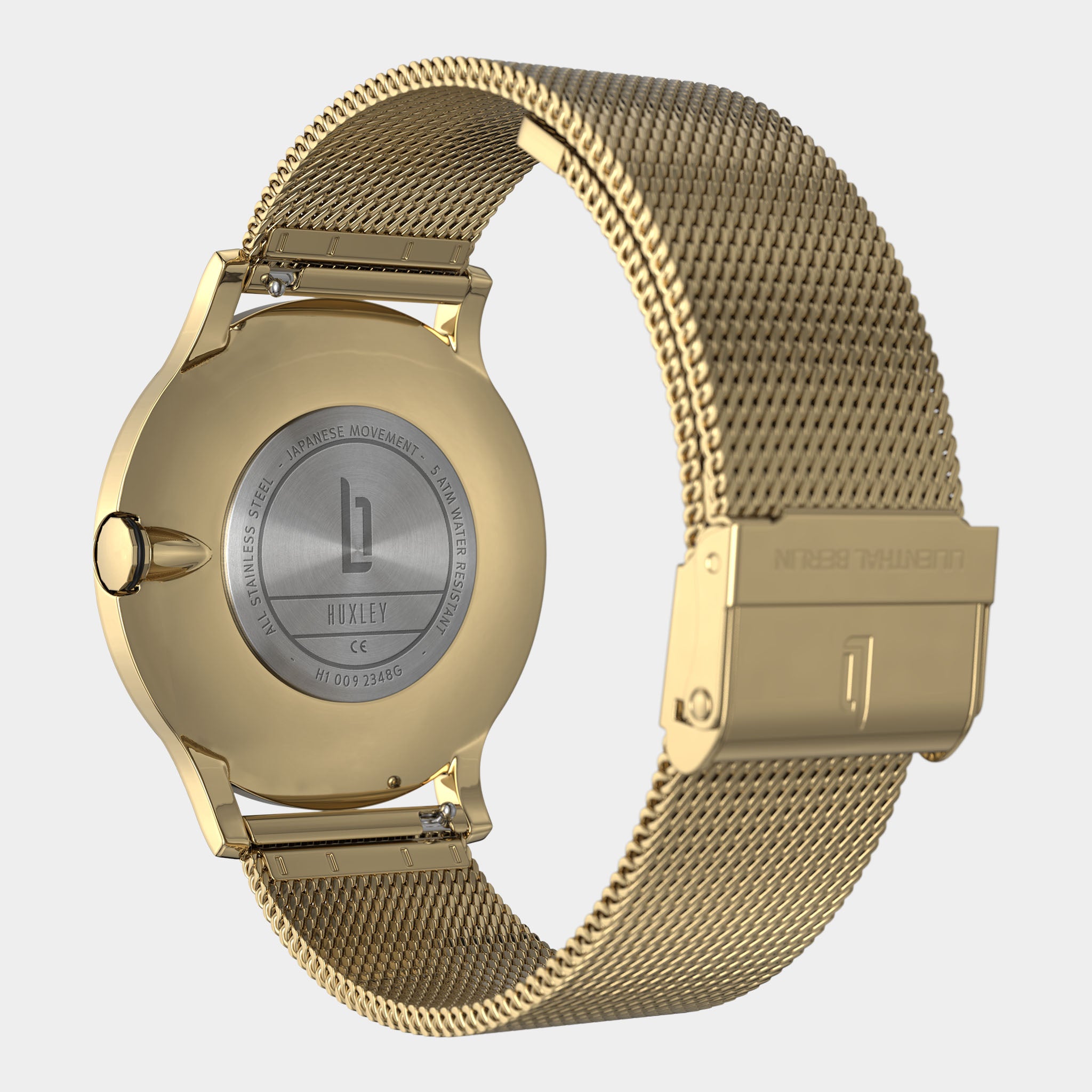 Gold mesh band watch with stainless steel back, Japanese movement, and secure clasp