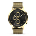 Gold mesh band chronograph watch with black and gold dial, minimalist design, date display