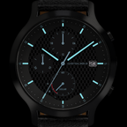 Black analog solar watch with luminous hands, subdials, date display, and textured face